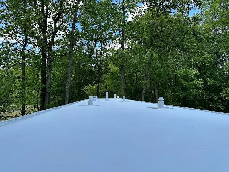 Eliseo Morales and the Morales's Roofing crew working on a residential roof in Annandale, Virginia